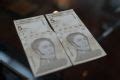 Venezuela burns through cash to shore up new bolivar.